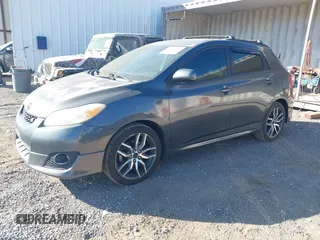 2009 Toyota Matrix S z VIN 2T1LE40E09C006482, wystawiony jako IAAI lot #42624578 z przebiegiem 163 224 mil mil oraz . Historia ofert i sprzedaży dostępna na DreamBid. Obrazek 17.
