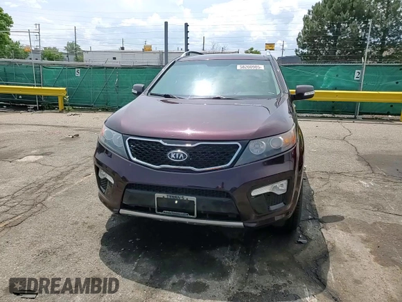2013 Kia Sorento SX with VIN 5XYKWDA2XDG363999, listed as a Copart auction lot 58200985 with 69,056 mi miles and Salvage title. Bid and sale history available at DreamBid. Image 13.
