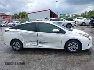 2017 Toyota Prius Two with VIN JTDKBRFU5H3044068, listed as a IAAI auction lot 42462917 with 116,261 mi miles and . Bid and sale history available at DreamBid. Image 13.