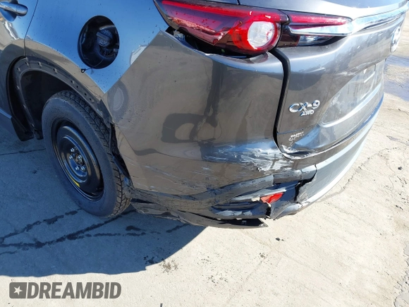 2022 Mazda CX-9 Sport with VIN JM3TCBBY5N0614589, listed as a IAAI auction lot 41295944 with 49,193 mi miles and . Bid and sale history available at DreamBid. Image 6.