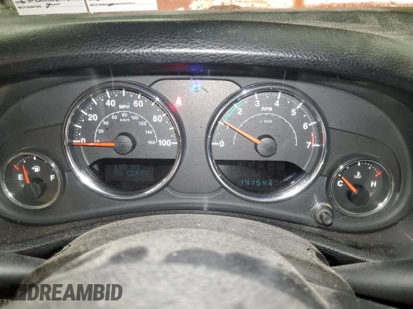 2014 Jeep Wrangler Sport with VIN 1C4AJWAG7EL197285, listed as a Copart auction lot 63451105 with 141,547 mi miles and Salvage title. Bid and sale history available at DreamBid. Image 9.