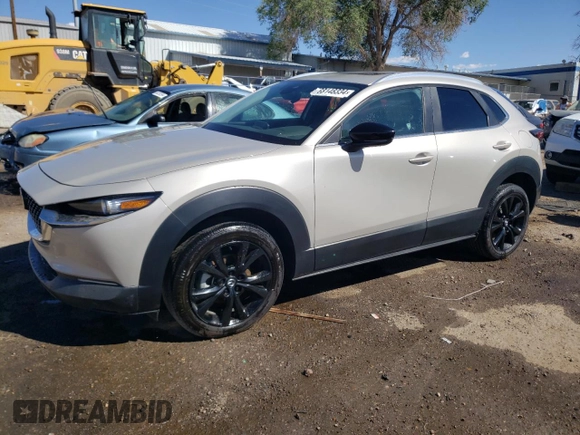 2022 Mazda CX-30 2.5 Turbo with VIN 3MVDMBAY1NM447753, listed as a Copart auction lot 68148334 with 5,180 mi miles and Salvage Title. Bid and sale history available at DreamBid. Image 1.