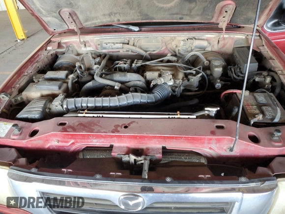 1999 Mazda B-Series 2WD Truck SE with VIN 4F4YR16V0XTM10024, listed as a Copart auction lot 82905694 with 163,025 mi miles and Salvage Title. Bid and sale history available at carsss.com. Image 11.