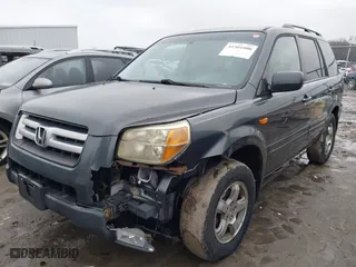 2006 Honda Pilot EX-L with RES with VIN 2HKYF18676H551683, listed as a IAAI auction lot 41501000 with 288,473 mi miles. Bid and sale history available at carsss.com. Image 17.