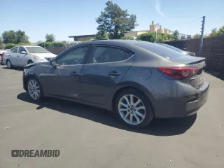 2014 Mazda 3 S Touring with VIN JM1BM1V39E1145478, listed as a Copart auction lot 57860645 with 55,322 mi miles and Salvage title. Bid and sale history available at DreamBid. Image 2.