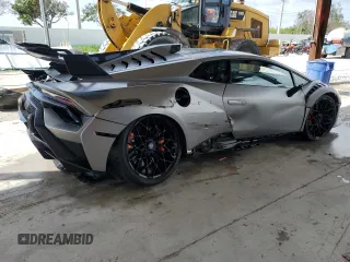 2023 Lamborghini Huracan z VIN ZHWUA6ZX6PLA25067, wystawiony jako Copart lot #79047854 z przebiegiem 13 217 mil mil oraz Nie do naprawy • Non repairable. Historia ofert i sprzedaży dostępna na DreamBid. Obrazek 3.