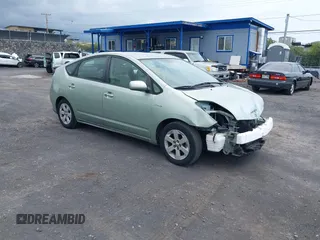 2007 Toyota Prius z VIN JTDKB20U077608510, wystawiony jako IAAI lot #41847255 z przebiegiem 129 112 mil mil oraz . Historia ofert i sprzedaży dostępna na DreamBid. Obrazek 1.