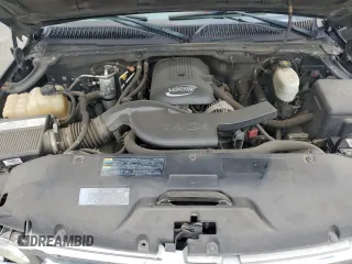 2005 Chevrolet Tahoe Z71 with VIN 1GNEC13T85R141076, listed as a Copart auction lot 54733415 with 310,992 mi miles and Salvage title. Bid and sale history available at DreamBid. Image 12.