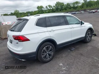 2018 Volkswagen Tiguan SEL with VIN 3VV2B7AX7JM099570, listed as a IAAI auction lot 42374274 with 87,838 mi miles and . Bid and sale history available at DreamBid. Image 4.