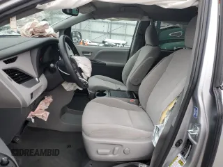 2017 Toyota Sienna LE with VIN 5TDJZ3DC5HS187003, listed as a Copart auction lot 84182284 with 85,045 mi miles and Salvage Title. Bid and sale history available at carsss.com. Image 7.