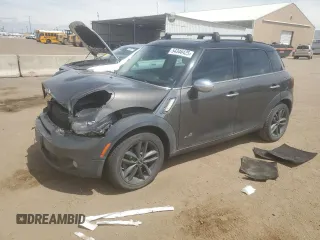 2013 MINI Countryman S ALL4 z VIN WMWZC5C56DWM16203, wystawiony jako Copart lot #54346425 z przebiegiem 148 065 mil mil oraz Szkoda całkowita • Salvage title. Historia ofert i sprzedaży dostępna na DreamBid. Obrazek 1.