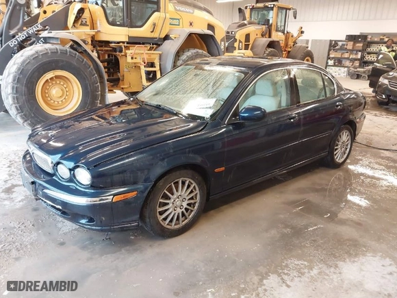 2006 Jaguar X-Type with VIN SAJWA51A56WE84382, listed as a IAAI auction lot 41594734 with NaN miles. Bid and sale history available at carsss.com. Image 2.