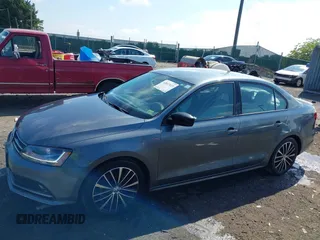 2017 Volkswagen Jetta Sport z VIN 3VWD17AJ6HM284934, wystawiony jako IAAI lot #42657613 z przebiegiem 85 929 mil mil oraz . Historia ofert i sprzedaży dostępna na DreamBid. Obrazek 15.