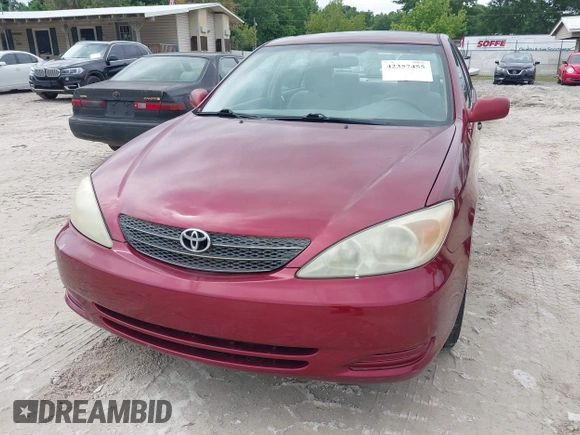 2002 Toyota Camry LE z VIN 4T1BE30K32U110304, wystawiony jako IAAI lot #42357455 z przebiegiem 221 389 mil mil oraz . Historia ofert i sprzedaży dostępna na DreamBid. Obrazek 6.