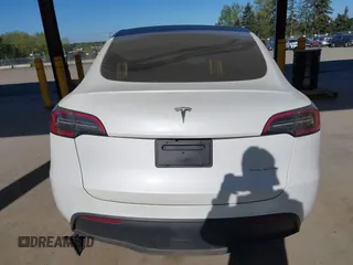 2024 Tesla Model Y Long Range with VIN 7SAYGAEEXRF988561, listed as a IAAI auction lot 42058248 with 7,845 mi miles. Bid and sale history available at carsss.com. Image 16.