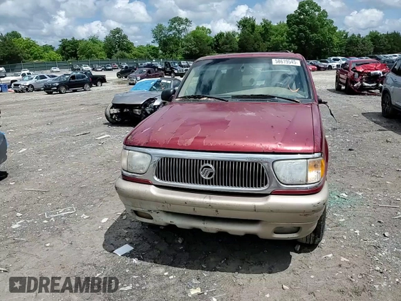 2000 Mercury Mountaineer with VIN 4M2ZU86P2YUJ30049, listed as a Copart auction lot 58619545 with 149,673 mi miles and Salvage title. Bid and sale history available at DreamBid. Image 14.
