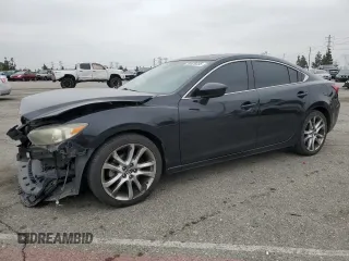 2014 Mazda 6 i Grand Touring with VIN JM1GJ1W61E1151931, listed as a Copart auction lot 50629335 with 114,948 mi miles and Salvage Title. Bid and sale history available at carsss.com. Image 1.