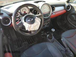 2013 MINI Convertible with VIN WMWZN3C58DT265980, listed as a Copart auction lot 77157154 with 88,975 mi miles and Salvage title. Bid and sale history available at DreamBid. Image 8.