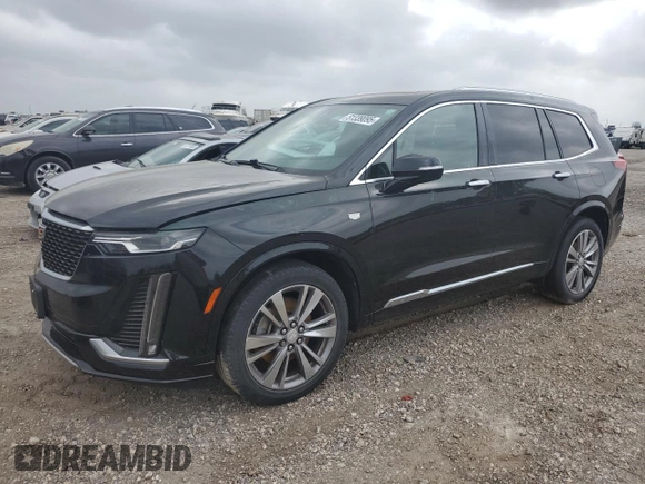 2020 Cadillac XT6 FWD Premium Luxury with VIN 1GYKPCRS8LZ125400, listed as a Copart auction lot 51339095 with 89,973 mi miles and Clean title. Bid and sale history available at DreamBid. Image 1.