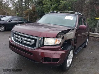 2009 Honda Ridgeline RTL with VIN 5FPYK16559B103698, listed as a IAAI auction lot 41479390 with 144,554 mi miles. Bid and sale history available at carsss.com. Image 17.