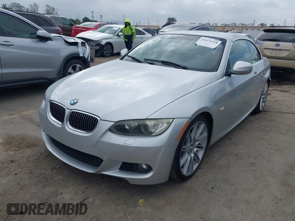 2010 BMW 3 Series 335i with VIN WBAWL7C53AP474127, listed as a IAAI auction lot 41871518 with 111,136 mi miles. Bid and sale history available at carsss.com. Image 2.