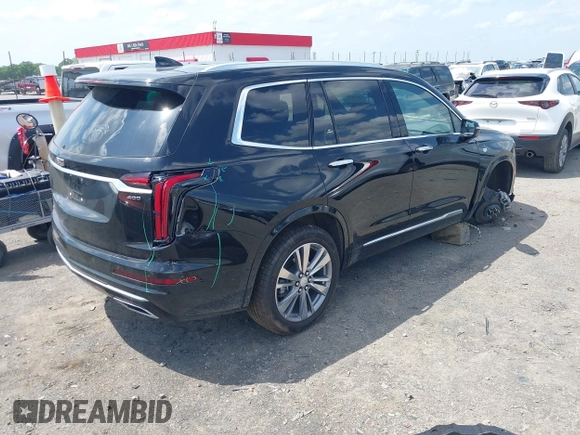 2025 Cadillac XT6 AWD Premium Luxury with VIN 1GYKPDRS3SZ118214, listed as a IAAI auction lot 42100315 with 12,795 mi miles and . Bid and sale history available at DreamBid. Image 4.