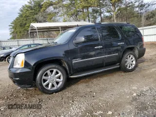 2012 GMC Yukon Denali with VIN 1GKS1EEF1CR304040, listed as a Copart auction lot 42874135 with 182,879 mi miles and Salvage Title. Bid and sale history available at carsss.com. Image 1.