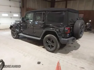 2019 Jeep Wrangler Unlimited Sahara with VIN 1C4HJXEG9KW579682, listed as a IAAI auction lot 41310472 with 74,265 mi miles. Bid and sale history available at carsss.com. Image 3.