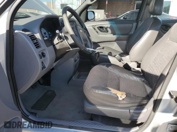 2002 Ford Escape XLS Choice with VIN 1FMYU02162KB03729, listed as a Copart auction lot 53274675 with 150,360 mi miles and Salvage title. Bid and sale history available at DreamBid. Image 7.
