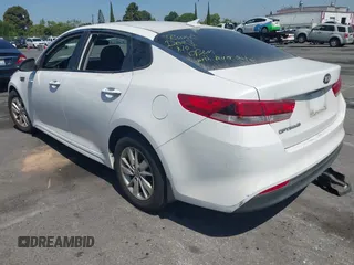 2016 Kia Optima LX with VIN 5XXGT4L34GG024846, listed as a IAAI auction lot 42325706 with 80,645 mi miles and . Bid and sale history available at DreamBid. Image 3.