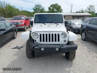 2015 Jeep Wrangler Unlimited Rubicon Hard Rock with VIN 1C4HJWFG7FL684057, listed as a IAAI auction lot 41963885 with 103,240 mi miles. Bid and sale history available at carsss.com. Image 12.