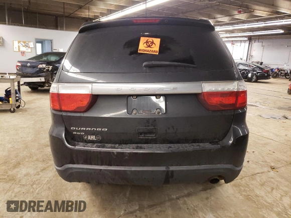 2012 Dodge Durango SXT z VIN 1C4RDJAG8CC198214, wystawiony jako Copart lot #52154065 z przebiegiem 128 787 mil mil oraz Nie do naprawy • Non repairable. Historia ofert i sprzedaży dostępna na DreamBid. Obrazek 6.
