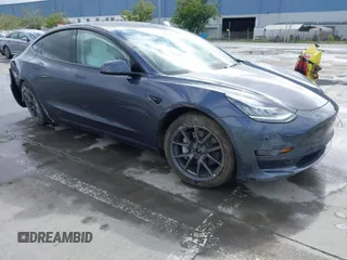 2022 Tesla Model 3 Long Range with VIN 5YJ3E1EB0NF259904, listed as a IAAI auction lot 41826642 with 42,272 mi miles and . Bid and sale history available at DreamBid. Image 1.