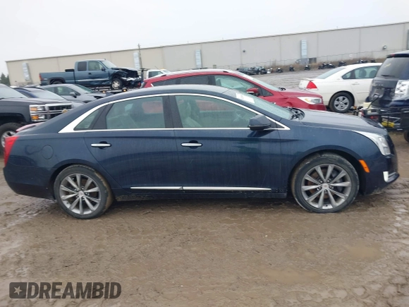 2013 Cadillac XTS Luxury with VIN 2G61P5S3XD9196239, listed as a IAAI auction lot 41205081 with 161,885 mi miles and . Bid and sale history available at carsss.com. Image 13.