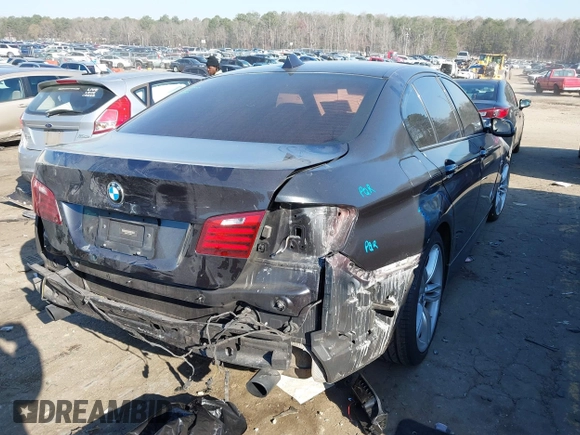 2014 BMW 5 Series 535i with VIN WBA5B1C54ED480604, listed as a IAAI auction lot 41779941 with 146,569 mi miles. Bid and sale history available at carsss.com. Image 4.