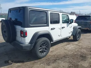 2024 Jeep Wrangler Sport S with VIN 1C4PJXDN4RW300936, listed as a IAAI auction lot 41671073 with 6,195 mi miles and . Bid and sale history available at DreamBid. Image 4.