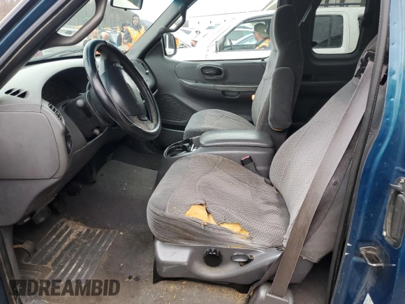 2000 Ford F-150 XL with VIN 1FTRX17W5YNA58235, listed as a Copart auction lot 84026504 with 0 mi miles and Salvage Title. Bid and sale history available at carsss.com. Image 7.