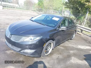 2015 Lincoln MKZ z VIN 3LN6L2G90FR602404, wystawiony jako IAAI lot #41946181 z przebiegiem 146 588 mil mil oraz . Historia ofert i sprzedaży dostępna na DreamBid. Obrazek 18.