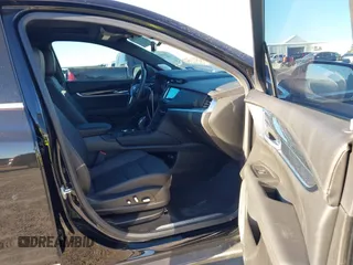 2024 Cadillac XT5 FWD Premium Luxury with VIN 1GYKNCRS4RZ729461, listed as a IAAI auction lot 41411300 with 5,760 mi miles. Bid and sale history available at carsss.com. Image 5.