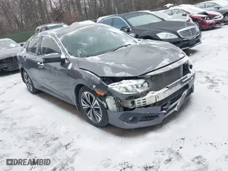 2016 Honda Civic Sedan EX-T with VIN 2HGFC1F33GH640252, listed as a IAAI auction lot 41593876 with NaN miles. Bid and sale history available at carsss.com. Image 1.