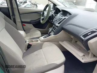 2012 Ford Focus SE with VIN 1FAHP3F24CL336350, listed as a IAAI auction lot 41882948 with 153,238 mi miles. Bid and sale history available at carsss.com. Image 5.