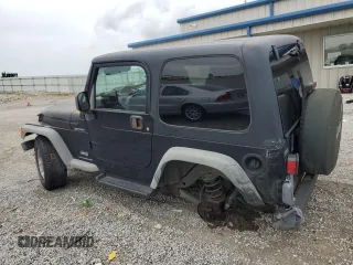 2003 Jeep Wrangler Sport with VIN 1J4FA49S43P321998, listed as a Copart auction lot 60860444 with 109,856 mi miles and Salvage Title. Bid and sale history available at carsss.com. Image 2.
