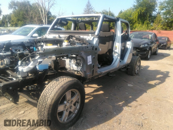 2022 Jeep Gladiator Willys with VIN 1C6HJTAG0NL131004, listed as a IAAI auction lot 40307060 with Not provided miles and . Bid and sale history available at DreamBid. Image 2.