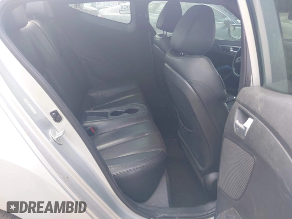 2013 Hyundai Veloster Turbo with VIN KMHTC6AE1DU177023, listed as a IAAI auction lot 42604617 with 102,087 mi miles and . Bid and sale history available at DreamBid. Image 8.