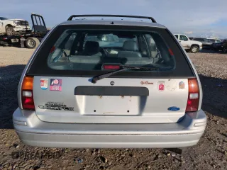 1993 Ford Escort z VIN 1FAPP15J7PW181838, wystawiony jako Copart lot #88717755 z przebiegiem 6 017 mil mil oraz Szkoda całkowita • Salvage title. Historia ofert i sprzedaży dostępna na DreamBid. Obrazek 6.