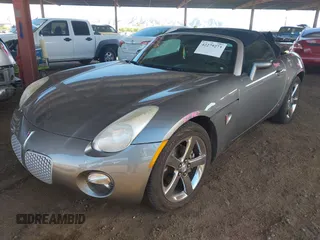 2006 Pontiac Solstice z VIN 1G2MB35B56Y112699, wystawiony jako IAAI lot #42279273 z przebiegiem 46 478 mil mil oraz . Historia ofert i sprzedaży dostępna na DreamBid. Obrazek 2.