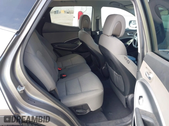 2018 Hyundai Santa Fe 2.4L with VIN 5NMZT3LB4JH069868, listed as a IAAI auction lot 42675555 with 142,612 mi miles and . Bid and sale history available at DreamBid. Image 8.