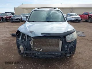 2007 Hyundai Santa Fe SE z VIN 5NMSH73E87H051418, wystawiony jako IAAI lot #41606640 z przebiegiem 185 407 mil mil oraz . Historia ofert i sprzedaży dostępna na DreamBid. Obrazek 13.