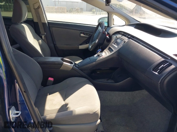 2012 Toyota Prius One z VIN JTDKN3DUXC1606235, wystawiony jako IAAI lot #42379298 z przebiegiem 169 332 mil mil oraz . Historia ofert i sprzedaży dostępna na DreamBid. Obrazek 5.