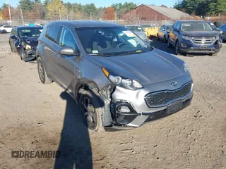 2021 Kia Sportage LX z VIN KNDPMCAC9M7933843, wystawiony jako IAAI lot #40708673 z przebiegiem 81 180 mil mil oraz . Historia ofert i sprzedaży dostępna na DreamBid. Obrazek 1.